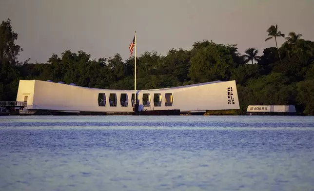 The USS Arizona Memorial is seen before a ceremony to mark the 83rd anniversary of the Japanese attack on Pearl Harbor, Saturday, Dec. 7, 2024, in Honolulu. (AP Photo/Mengshin Lin)