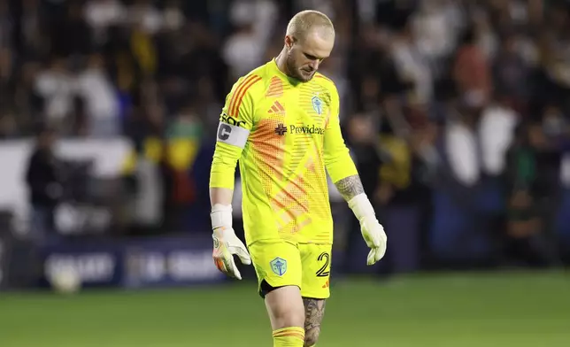 Seattle Sounders goalkeeper Stefan Frei walks off the pitch after a loss to the Los Angeles Galaxy in an MLS Western Conference final soccer match, Saturday, Nov. 30, 2024, in Carson, Calif. (AP Photo/Etienne Laurent)