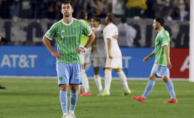 Seattle Sounders defender Jackson Ragen (25) stands on tue field after a loss to the Los Angeles Galaxy during an MLS Western Conference final soccer match, Saturday, Nov. 30, 2024, in Carson, Calif. (AP Photo/Etienne Laurent)