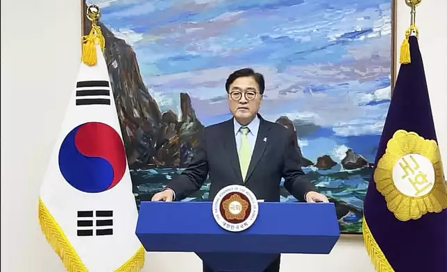 In this photo taken from video released by South Korea's National Assembly Speaker's Office on Tuesday, Dec. 3, 2024, South Korea's National Assembly Speaker Woo Won-shik delivers his speech. (South Korea's National Assembly Speaker's Office via AP)