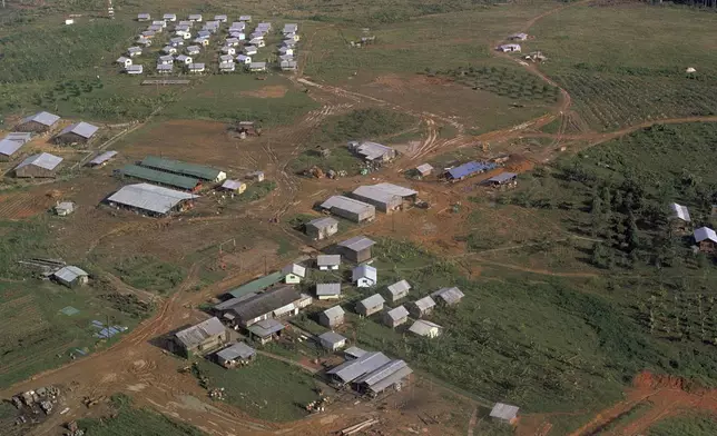 FILE - An aerial view of the Peoples Temple compound, after the bodies of the U.S. Rev. Jim Jones and more than 900 of his followers were removed, in Jonestown, Guyana, November 1978. (AP Photo, File)