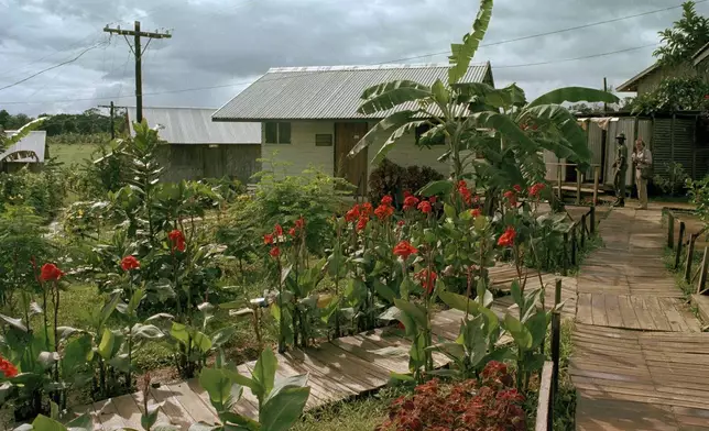 FILE - A view of the People's Temple compound, Jonestown, Guyana, November 1978, where more than 900 followers of the Rev. Jim Jones committed suicide. (AP Photo, File)