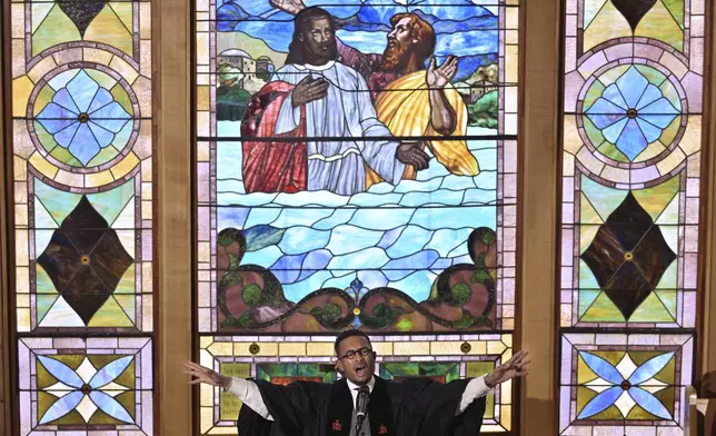 The Rev. Brandon Thomas Crowley speaks during Sunday service at Myrtle Baptist Church Sunday, May 5, 2024 in Newton, Mass. In 2015, Crowley, the senior pastor of the church, one of America's oldest Black churches, announced to his congregation, "I am a proud, Black, gay Christian male." (AP Photo/Josh Reynolds)