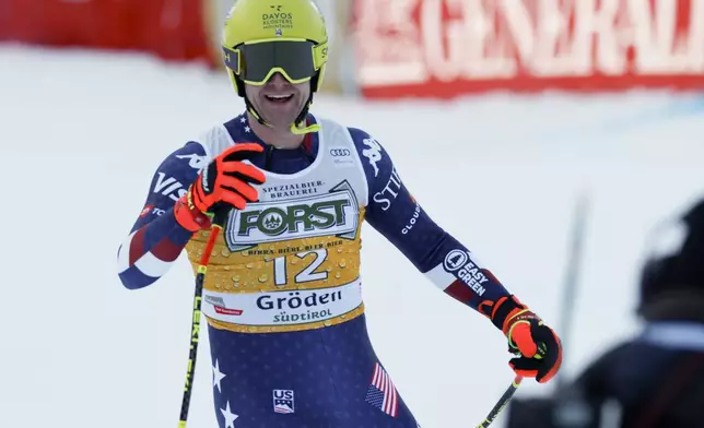 United States' Ryan Cochran Siegle celebrates at the finish area of an alpine ski, men's World Cup downhill, in Val Gardena, Italy, Saturday, Dec. 21, 2024. (AP Photo/Alessandro Trovati)