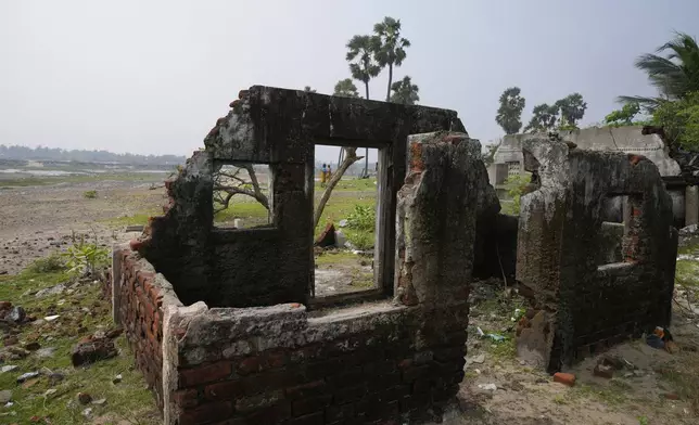 An abandoned and damaged house of 2004 tsunami stands on the beach of Nagapattinam, India, Monday, Dec.16, 2024. (AP Photo/Mahesh Kumar A.)