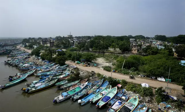 Boats of fishermen are anchored at a harbor in Nagapattinam, one of the severely damaged town during 2004 tsunami, India, Monday, Dec.16, 2024. (AP Photo/Mahesh Kumar A.)