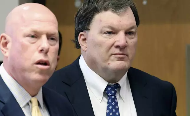 Rex A. Heuermann stands with his lawyer Michael Brown during a court hearing where he was charged with killing Valerie Mack, inside Supreme Court Justice Timothy Mazzei's courtroom at Suffolk County Court in Riverhead, N.Y. on Tuesday, Dec. 17, 2024. (James Carbone/Newsday via AP, Pool)