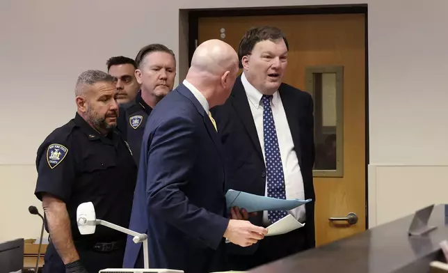 Rex A. Heuermann speaks during a court proceeding inside Supreme Court Justice Timothy Mazzei's courtroom at Suffolk County Court in Riverhead, N.Y. on Tuesday, Dec. 17, 2024. (James Carbone/Newsday via AP, Pool)