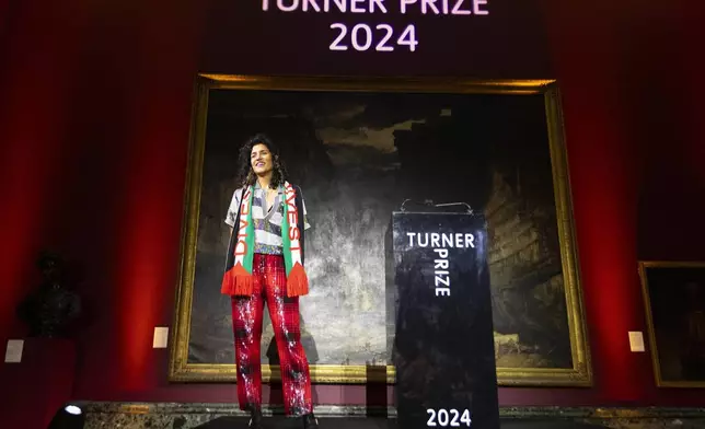 Jasleen Kaur is announced as the winner of the Turner Prize 2024 at Tate Britain, in London, Tuesday, Dec. 3, 2024. (David Parry/PA via AP)