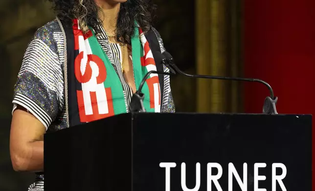 Jasleen Kaur is announced as the winner of the Turner Prize 2024 at Tate Britain, in London, Tuesday, Dec. 3, 2024. (David Parry/PA via AP)