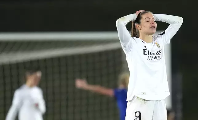 Real Madrid's Signe Bruun, right, reacts as Chelsea's Catarina Macario scoring a goal from penalty during the women's Champions League, group B soccer match between Real Madrid and Chelsea at the Alfredo Di Stefano stadium in Madrid, Spain, Tuesday, Dec. 17, 2024. (AP Photo/Manu Fernandez)