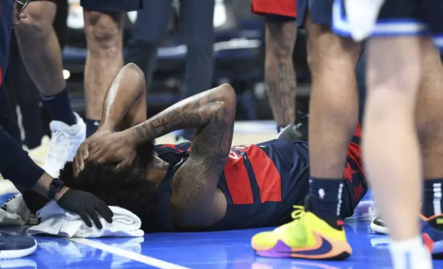 Washington Wizards forward Marvin Bagley III reacts during the second half of an NBA basketball game against the Oklahoma City Thunder, Monday, Dec. 23, 2024, in Oklahoma City. (AP Photo/Kyle Phillips)