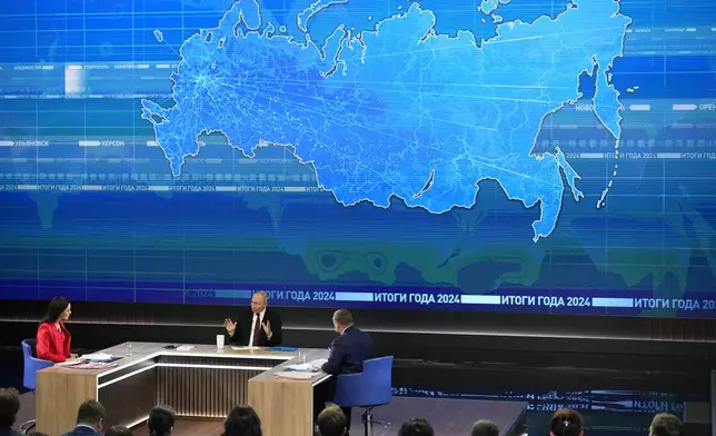 Russian President Vladimir Putin speaks during his annual news conference and call-in show at Gostinny Dvor in Moscow, Russia, Thursday, Dec. 19, 2024. (AP Photo/Alexander Zemlianichenko)