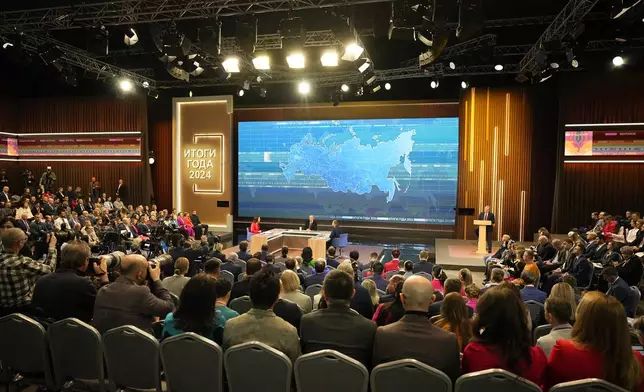 Russian President Vladimir Putin speaks during his annual news conference and call-in show at Gostinny Dvor in Moscow, Russia, Thursday, Dec. 19, 2024. (AP Photo/Alexander Zemlianichenko)