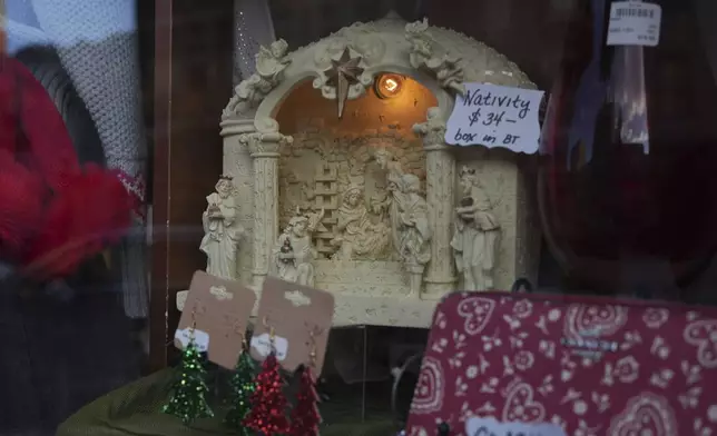 A Nativity scene on display on store front in Bethlehem, Pa., on Sunday, Dec. 1, 2024. (AP Photo/Luis Andres Henao)