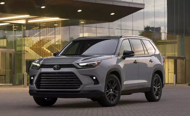 This photo provided by Toyota shows the 2024 Grand Highlander. It has one of most adult-friendly third rows you'll find and scores high for fuel efficiency, comfort and technology. (Toyota Motor Sales U.S.A. via AP)