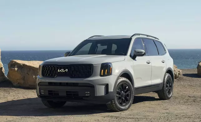 This photo provided by Kia shows the 2025 Telluride. It boasts a quiet cabin, impressive tech, extensive standard features and adult-friendly third-row seating. (Kia America via AP)