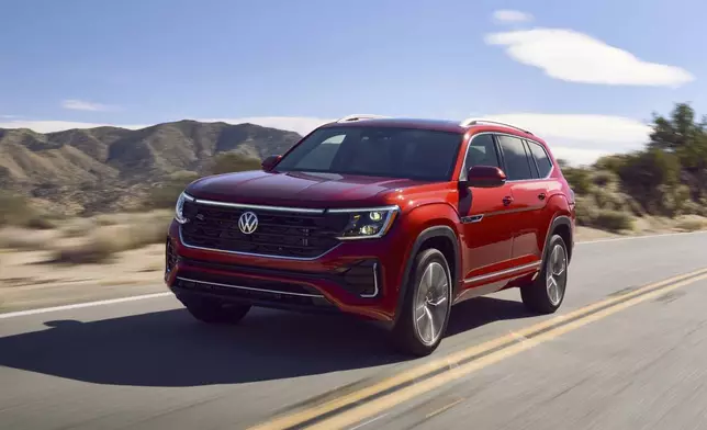 This photo provided by Volkswagen shows the 2025 Atlas. With a massive cargo area and space for adults in all three rows, it's one of the most spacious midsize SUVs you can buy. (Volkswagen of America via AP)