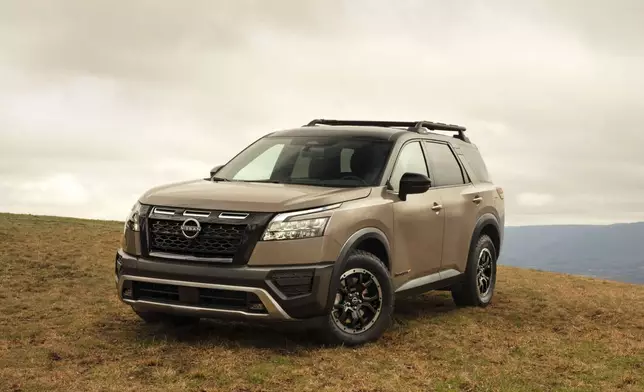 This photo provided by Nissan shows the 2025 Pathfinder. The Rock Creek version pictured here has all-terrain tires and a lifted suspension to provide a bit more off-road capability. (Nissan North America via AP)