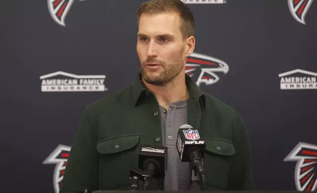 Atlanta Falcons quarterback Kirk Cousins speaks during a news conference after the 42-21 loss to the Minnesota Vikings of an NFL football game, Sunday, Dec. 8, 2024, in Minneapolis. (AP Photo/Bruce Kluckhohn