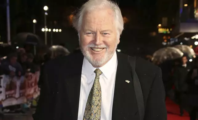 FILE - Actor Ian Lavender poses for photographers upon arrival at the World premiere of the film 'Dad's Army' at a central London cinema, Jan. 26, 2016. (Photo by Joel Ryan/Invision/AP, File)