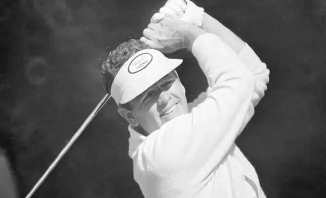 FILE - Former Masters champ Jack Burke tees off during a practice rounds at the Augusta National Golf Club in Augusta, Ga., April 11, 1974. (AP Photo/Paul Vathis, File)