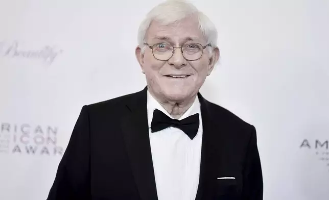 FILE - Phil Donahue attends the 2019 American Icon Awards at the Beverly Wilshire Hotel on May 19, 2019, in Beverly Hills, Calif. (Photo by Richard Shotwell/Invision/AP, File)