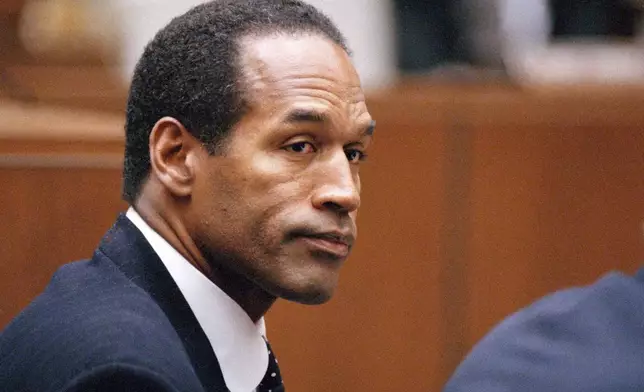 FILE - O.J. Simpson sits at his arraignment in Superior Court in Los Angeles on July 22, 1994. (AP Photo/Pool/Lois Bernstein, Pool, File)