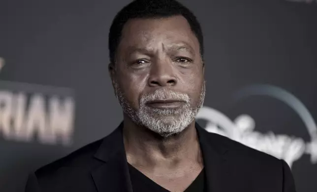 FILE - Carl Weathers attends the LA premiere of "The Mandalorian," at the El Capitan Theatre, Nov. 13, 2019, in Los Angeles. (Photo by Richard Shotwell/Invision/AP, File)