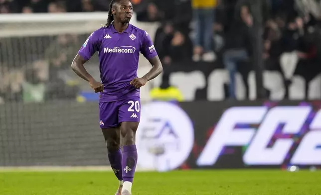 Fiorentina's Moise Kean celebrates after scoring his side's first goal during the Serie A soccer match between Juventus Turin and Fiorentina in Turin, Italy, Sunday, Dec. 29, 2024. (Fabio Ferrari/LaPresse via AP)