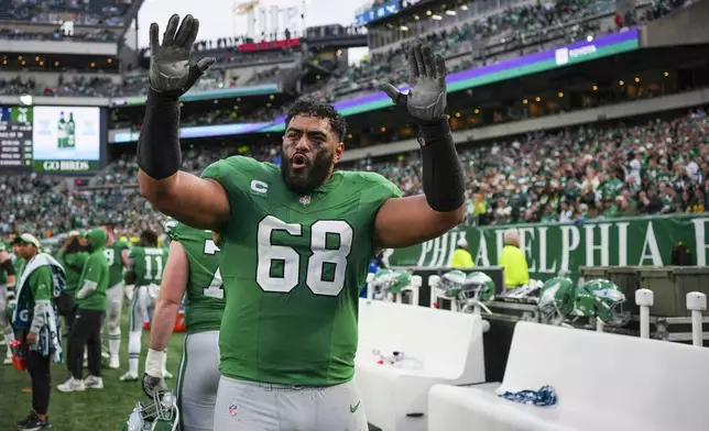 Philadelphia Eagles offensive tackle Jordan Mailata reacts on the sidelines during the second half of an NFL football game against the Dallas Cowboys, Sunday, Dec. 29, 2024, in Philadelphia. (AP Photo/Matt Slocum)