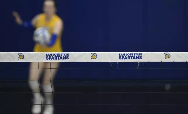 The San Jose State Spartans logo is seen on the net during the third set of an NCAA college volleyball match against the Air Force Falcons, Thursday, Oct. 31, 2024, in San Jose, Calif. (AP Photo/Eakin Howard)