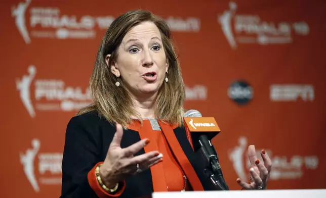 FILE - WNBA Commissioner Cathy Engelbert speaks at a news conference before Game 1 of basketball's WNBA Finals between the Connecticut Sun and the Washington Mystics, on Sept. 29, 2019, in Washington. (AP Photo/Patrick Semansky, File)