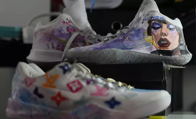 Shoes painted by California basketball player Jayda Noble are displayed in Berkeley, Calif., Monday, Oct. 21, 2024. (AP Photo/Jeff Chiu)