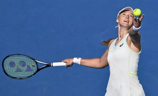 Lina Glushko of Israel serves against Naomi Osaka of Japan during a women's singles match at the ASB Classic tennis tournament at Manuka Doctor Arena in Auckland, New Zealand Monday, Dec. 30, 2024. (Alan Lee/Photosport via AP)