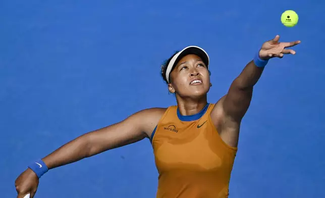 Namoi Osaka of Japan serves against Lina Glushko of Israel during a women's singles match at the ASB Classic tennis tournament at Manuka Doctor Arena in Auckland, New Zealand Monday, Dec. 30, 2024. (Alan Lee/Photosport via AP)