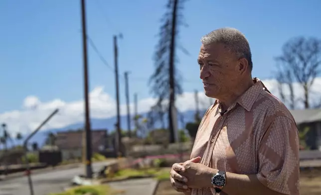 FILE - Maui Mayor Richard Bissen looks on during a media tour on Front Street, showing recovery efforts after 2023's wildfire, June 26, 2024, in Lahaina, Hawaii. (AP Photo/Mengshin Lin, File)