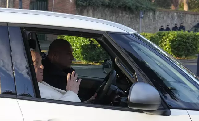 Pope Francis arrives at the Rebibbia Prison where he symbolically opens a Holy Door with inmates in Rome, Thursday, Dec. 26, 2024. (AP Photo/Gregorio Borgia)