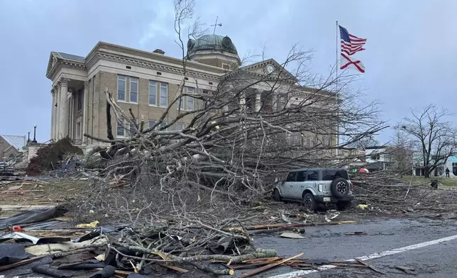 Damage from a storm through that rolled through the night before is seen at the heart of downtown on Sunday, Dec. 29, 2024, in Athens, Ala. (AP Photo/Lance George)