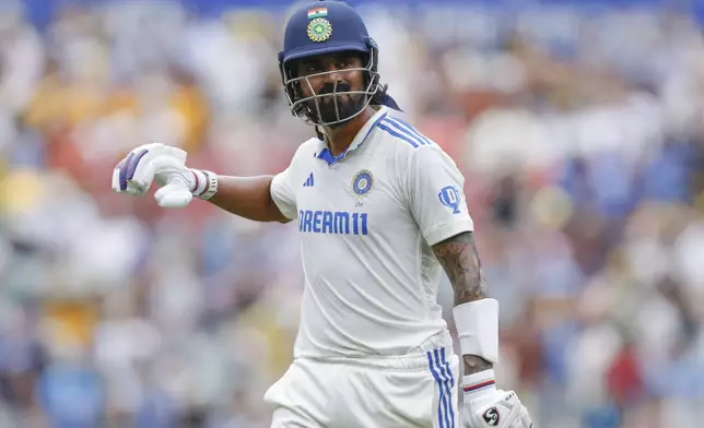 India's KL Rahul reacts as he walks off the field after losing his wicket during the day one of the second cricket test match between Australia and India at the Adelaide Oval in Adelaide, Australia, Friday, Dec. 6, 2024. (AP Photo/James Elsby)