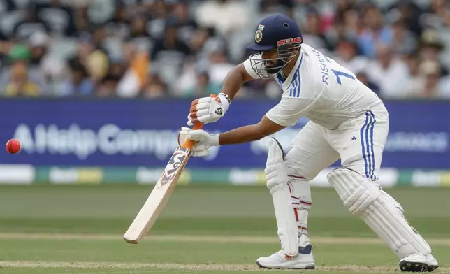 India's Rishabh Pant plays a shot during the day one of the second cricket test match between Australia and India at the Adelaide Oval in Adelaide, Australia, Friday, Dec. 6, 2024. (AP Photo/James Elsby)