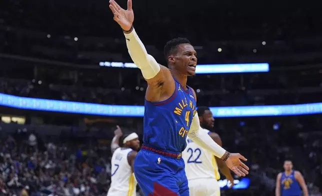 Denver Nuggets guard Russell Westbrook argues for a call in the first half of an Emirates NBA Cup basketball game against the Golden State Warriors Tuesday, Dec. 3, 2024, in Denver. (AP Photo/David Zalubowski)