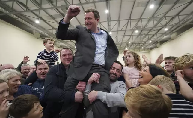 Padraig O'Sullivan celebrates being elected for Cork North-Central, at Nemo Rangers GAA Club in Cork, as the election count continues for the Irish General Election, Sunday Dec. 1, 2024. (Jacob King/PA via AP)