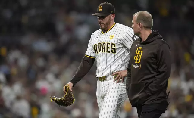 FILE - San Diego Padres starting pitcher Joe Musgrove exits the game during the fourth inning in Game 2 of an NL Wild Card Series baseball game against the Atlanta Braves, Wednesday, Oct. 2, 2024, in San Diego. (AP Photo/Gregory Bull, File)