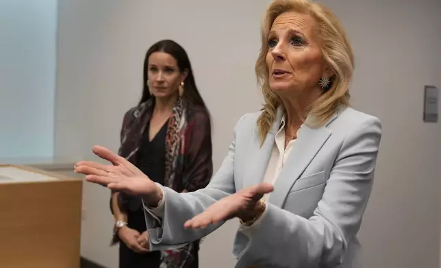 First lady Jill Biden, right, and her daughter Ashley Biden attend their visit to Cleveland Clinic in Abu Dhabi, United Arab Emirates, Thursday, Dec. 05, 2024. (AP Photo/Altaf Qadri)