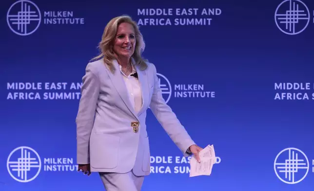 U.S. first lady Jill Biden arrives to attend the Milken Institute's Middle East and Africa Summit in Abu Dhabi, United Arab Emirates, Thursday, Dec. 5, 2024. (AP Photo/Altaf Qadri)