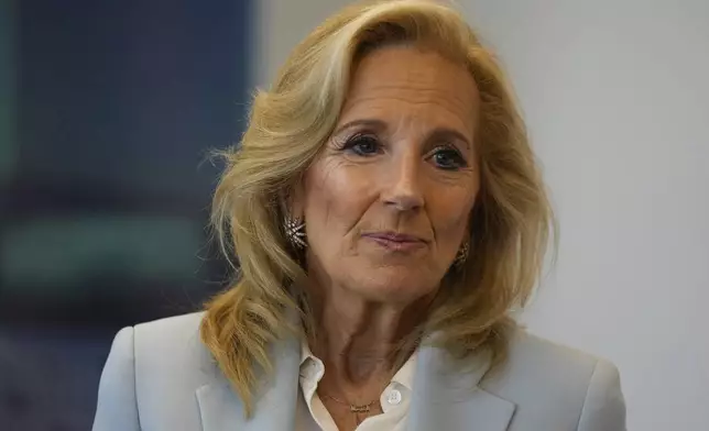 First lady Jill Biden meets medical staff at Cleveland Clinic in Abu Dhabi, United Arab Emirates, Thursday, Dec. 05, 2024. (AP Photo/Altaf Qadri)