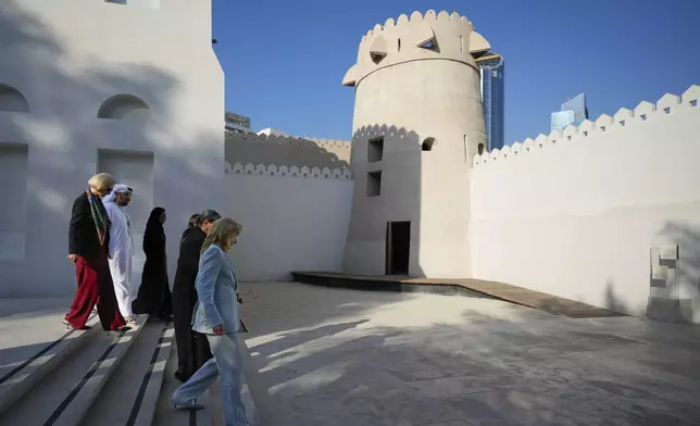 First lady Jill Biden, foreground, visits Kasr Al Hosn Fort, in Abu Dhabi, United Arab Emirates, Thursday, Dec. 5, 2024. (AP Photo/Altaf Qadri)