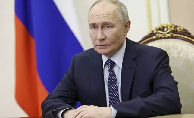 Russian President Vladimir Putin chairs a Security Council meeting via videoconference at the Kremlin in Moscow, Russia, Saturday, Dec. 28, 2024. (Sergei Ilyin, Sputnik, Kremlin Pool Photo via AP)