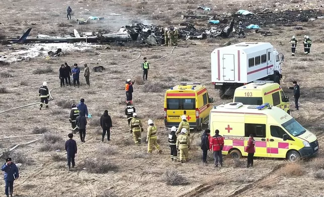 The wreckage of Azerbaijan Airlines Embraer 190 lays on the ground near the airport of Aktau, Kazakhstan, Wednesday, Dec. 25, 2024. (AP Photo/Azamat Sarsenbayev)